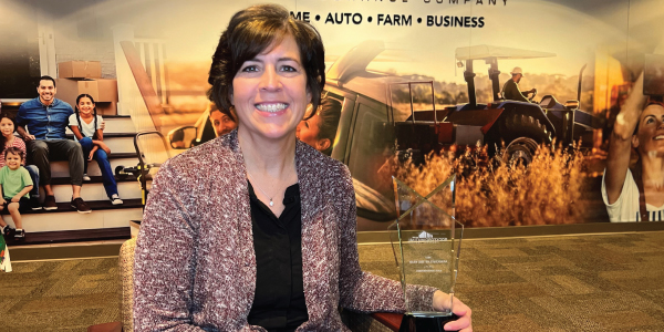 Woman holding an award