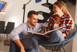 Couple, Reading, Sitting, Communicating